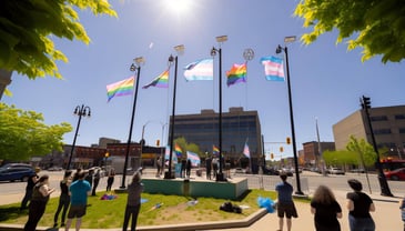 Pride and Trans flags flying in a public space